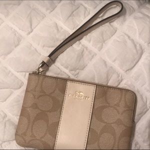 A small coach wristlet